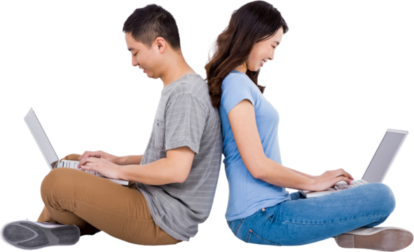 Happy young couple using laptop while sitting back to back