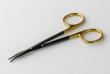 surgical scissors photo on light background, selective focus. Surgical instruments product photography