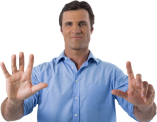 Male executive pressing an invisible virtual screen