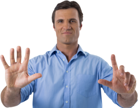 Male executive pressing an invisible virtual screen