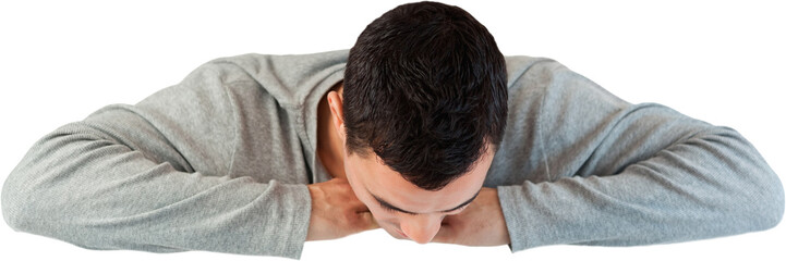 Fototapeta premium Young male looking down a wall