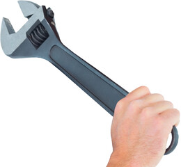 Hand holding metal wrench