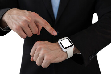 Mid section of businessman pointing on smart watch