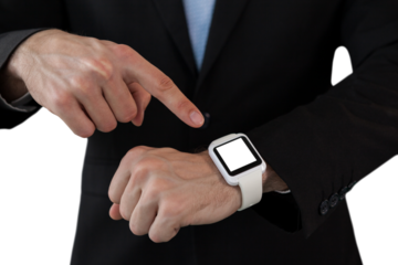 Mid section of businessman pointing on smart watch