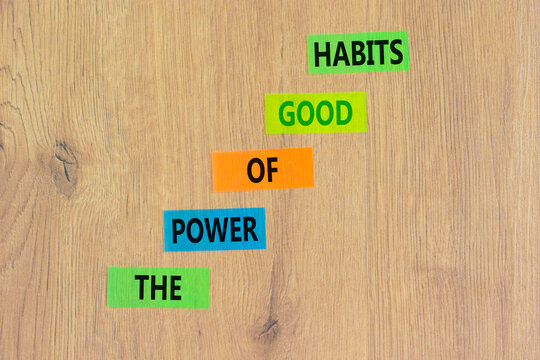 The power of good habits symbol. Concept words The power of good habits on colored paper. Beautiful wooden table wooden background. Business the power of good habits concept. Copy space.