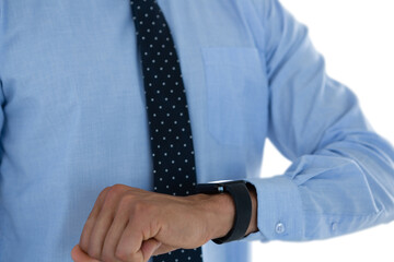 Mid section of businessman wearing smartwatch