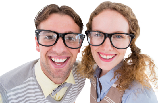 Happy geeky hipster smiling at camera 