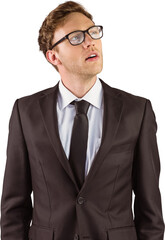 Young businessman thinking and looking up