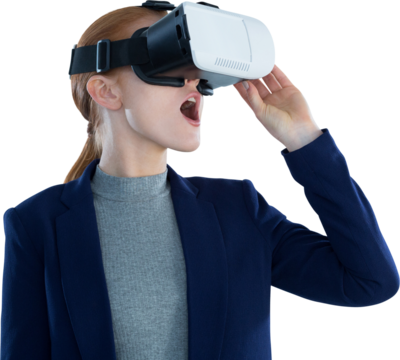 Surprised businesswoman wearing vr glasses - Powered by Adobe