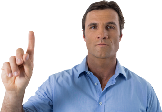 Male executive pressing an invisible virtual screen