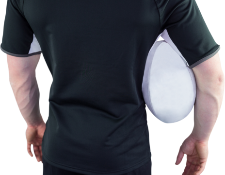 Rugby player holding a rugby ball
