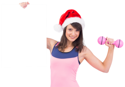 Festive fit brunette smiling at camera holding poster - Powered by Adobe