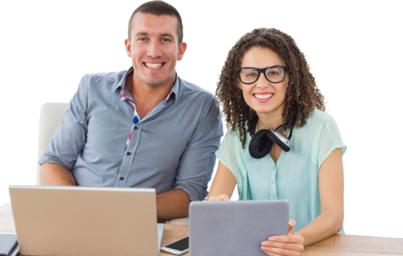 Portrait of creative business people with technologies at desk