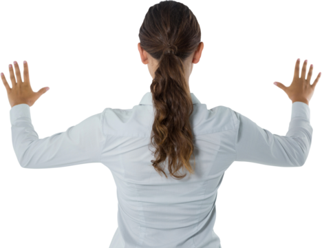 Female executive gesturing against white background