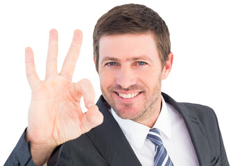 Businessman smiling and making ok sign