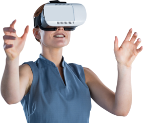 Happy young businesswoman gesturing while wearing virtual reality glasses