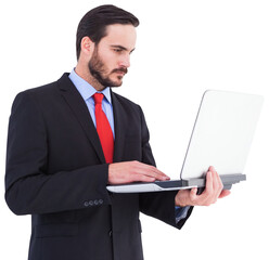Focused businessman using his laptop