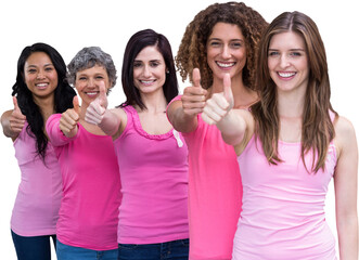 Portrait of confident females showing thumbs up while standing in line for breast cancer awareness