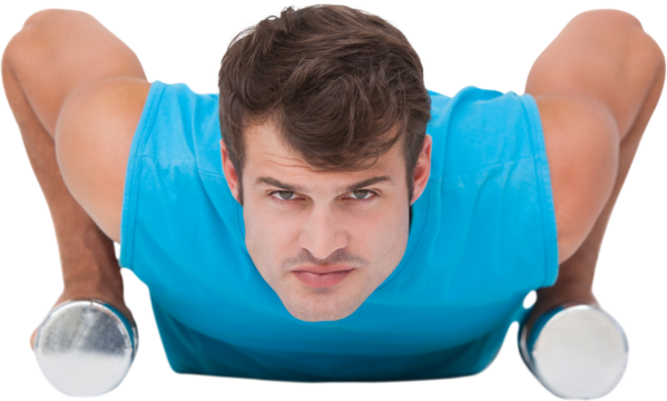 Fit man doing push ups with dumbbells