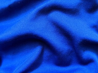 Fototapeta na wymiar Pleat on a blue fabric,blue fabric background 