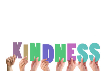Cropped hands holding colorful word kindness 