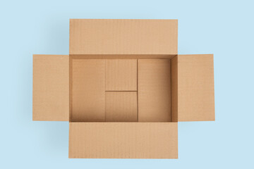 Cardboard box for delivery, parcels. On a blue, blue background