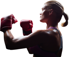 Side view of female boxer with fighting stance