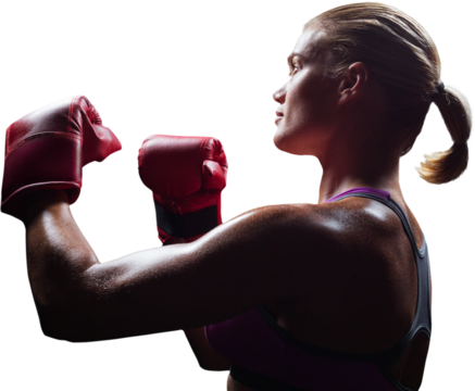 Side view of female boxer with fighting stance
