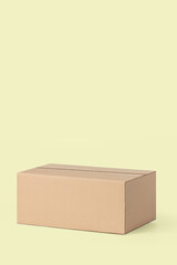 Cardboard box for delivery, parcels. On a yellow background