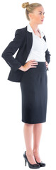 Businesswoman standing with hands on hips