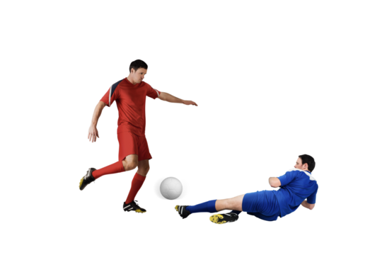 Football players tackling for the ball