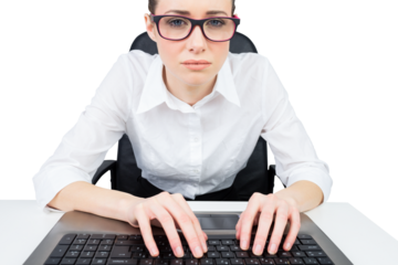 Businesswoman typing on a keyboard