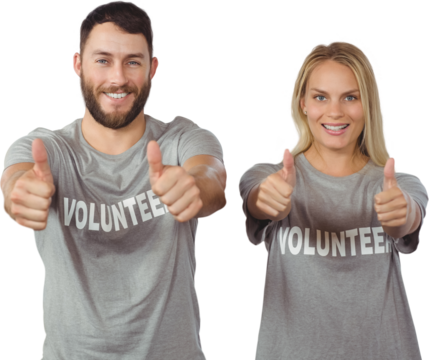 Smiling volunteers giving thumbs up