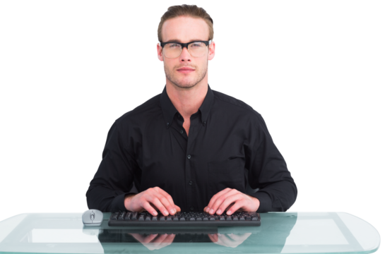 Focused businessman with reading glasses working  - Powered by Adobe
