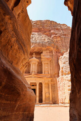 the treasury or Al-khazneh in petra view from the siq in sunny day