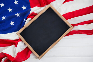 High angle view of chalkboard with American flag