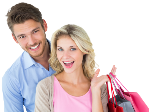 Attractive young couple holding shopping bags - Powered by Adobe
