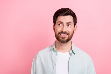Photo portrait of nice young male toothy beaming smile look empty space dressed stylish blue clothes isolated on pink color background