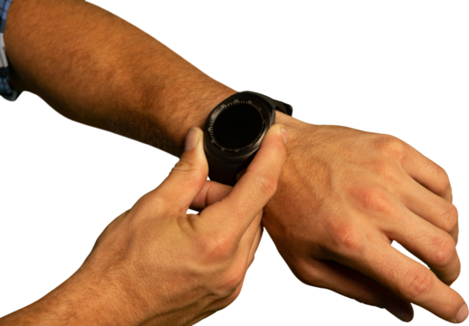 Mid-section of man using smartwatch
