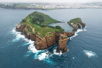 Vila Franca Islet, also known as the Princess Ring is a vegetated uninhabited islet located off the south central coast of the island of Sao Miguel in the Portuguese archipelago of the Azores