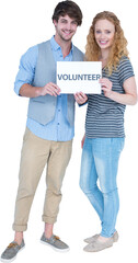 Obraz premium Happy couple holding a volunteer note