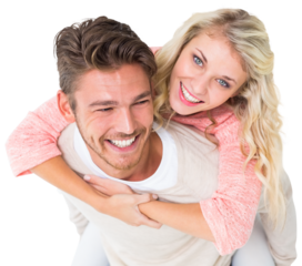 Handsome man giving piggy back to his girlfriend