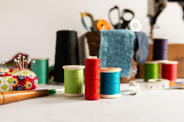 a vintage sewing machine with sewing supplies