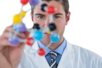 Young scientist experimenting molecule structure