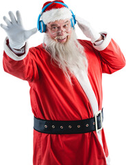 Portrait of Santa claus listening to music on headphones