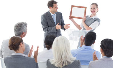 Fototapeta premium Business people receiving award