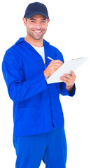 Portrait of happy male mechanic writing on clipboard