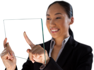 Smiling young businesswoman using glass interface