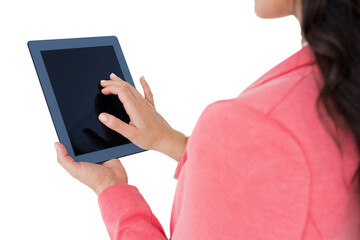 Elegant brunette using tablet
