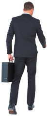 Businessman walking with his briefcase